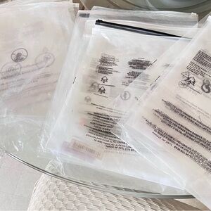 20ct   ASSORTED USED POLY SHIRT BAGS